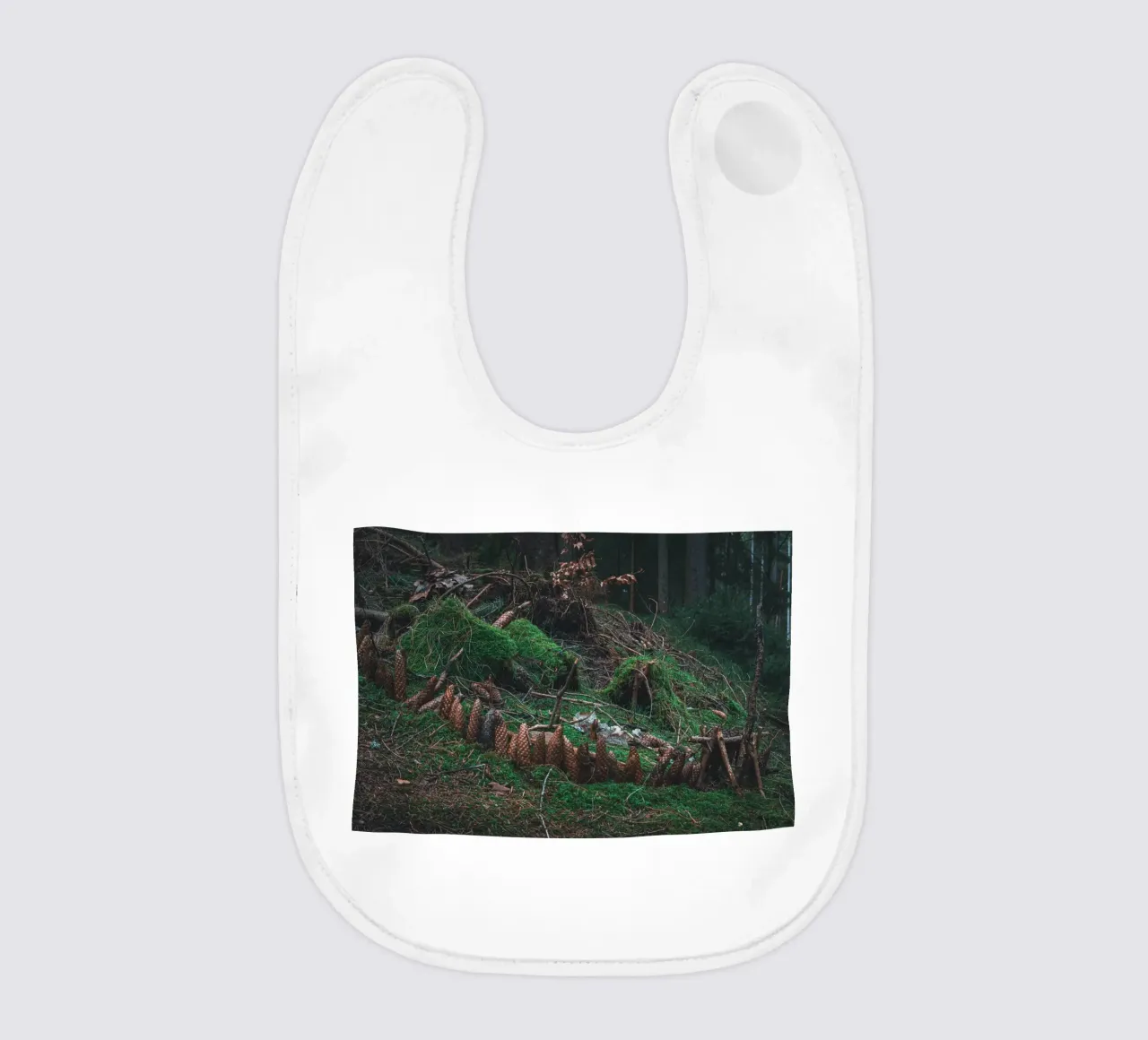 Small structure made of moss and pine cones in the Thuringian Forest baby bib by Marcus Beckert | Fotografie