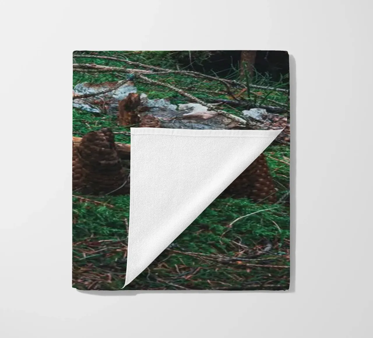 Small structure made of moss and pine cones in the Thuringian Forest beach towel by Marcus Beckert | Fotografie