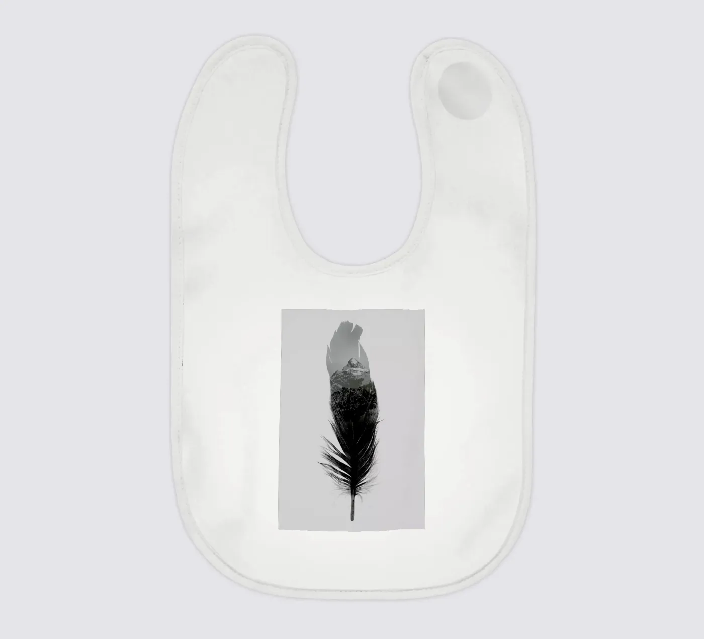 Feather baby bib by Chris Wharton