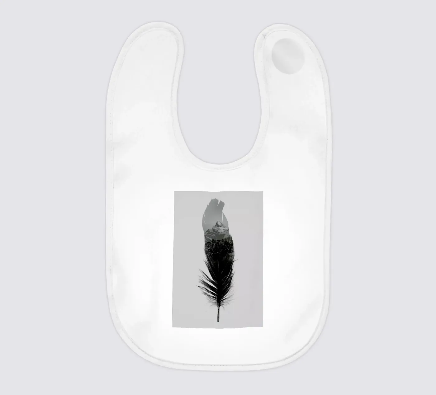 Feather baby bib by Chris Wharton
