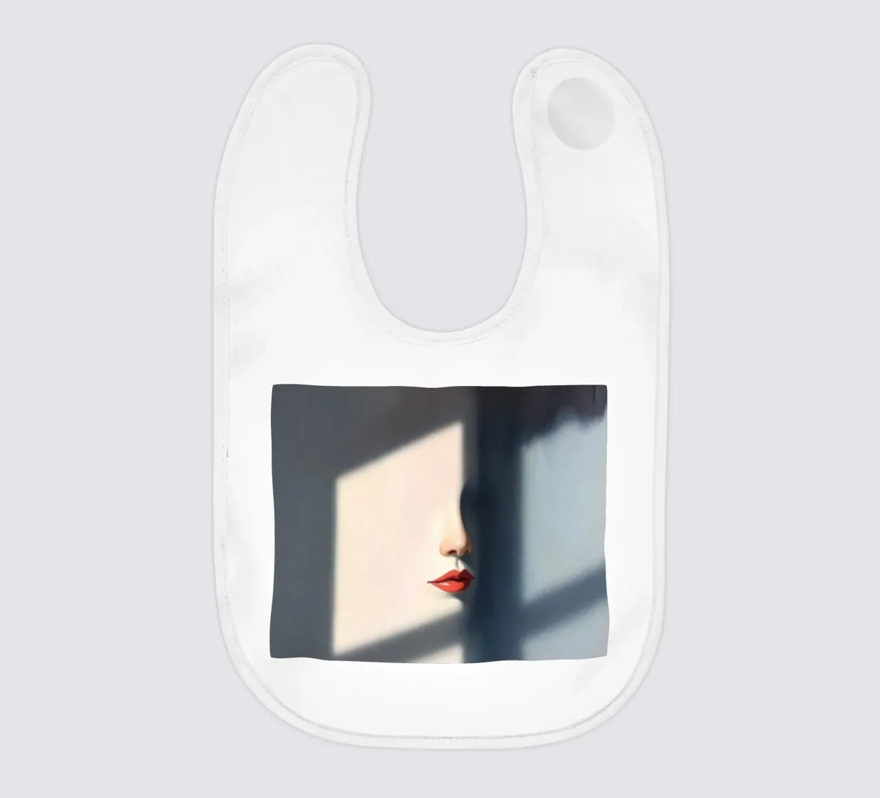 Shadows and light create an intriguing portrait of a face baby bib by DesignDoodle