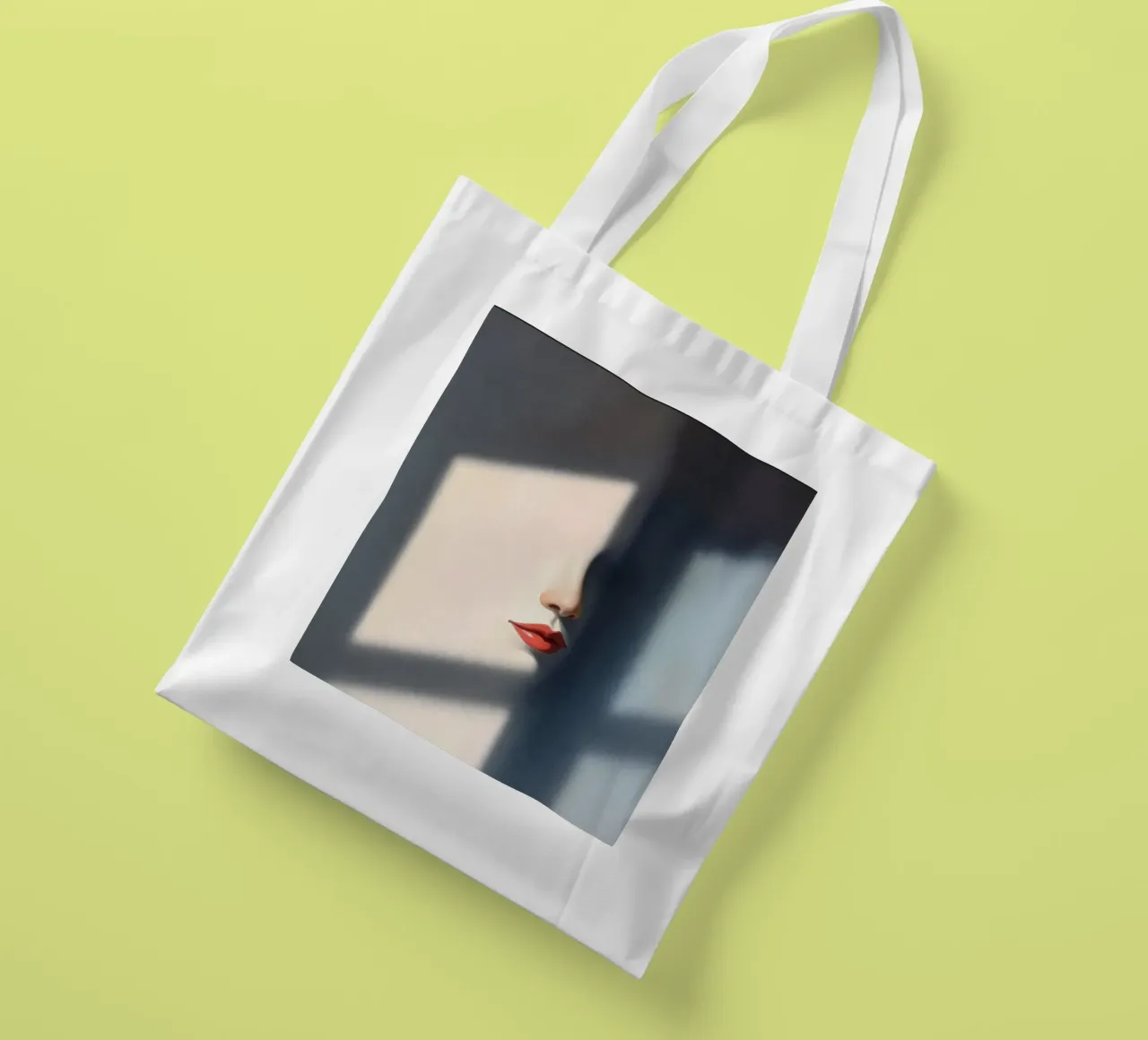 Shadows and light create an intriguing portrait of a face tote bag by DesignDoodle