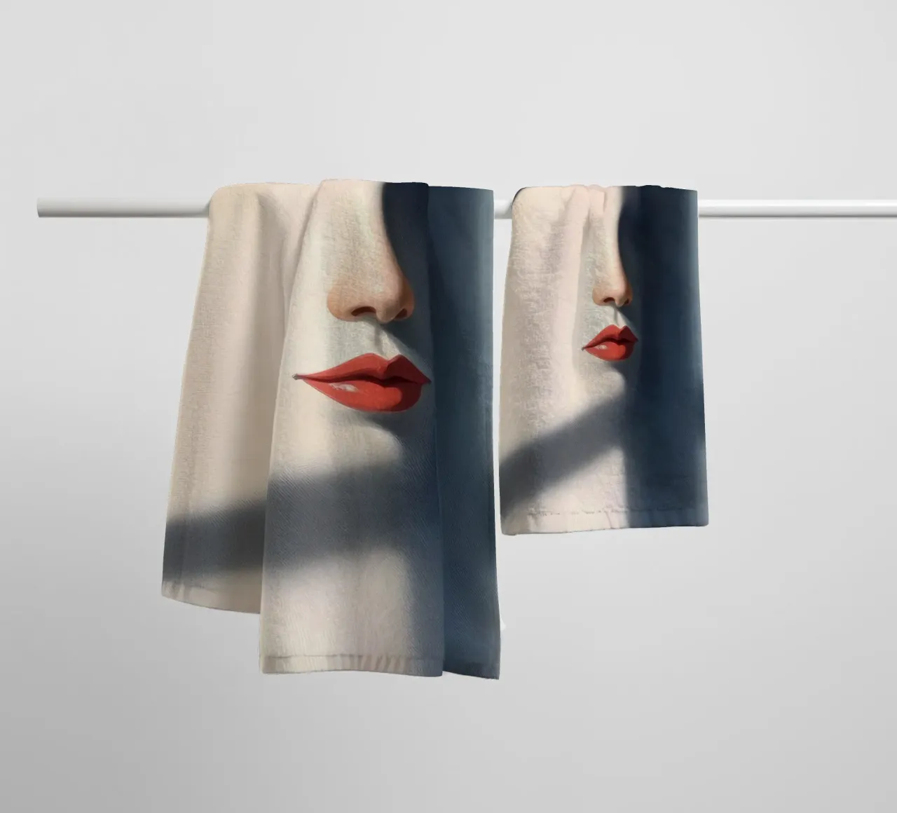 Shadows and light create an intriguing portrait of a face towel by DesignDoodle
