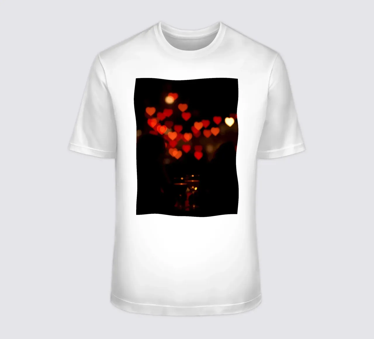Romantic evening with heart-shaped lights in the background t-shirt by DesignDoodle