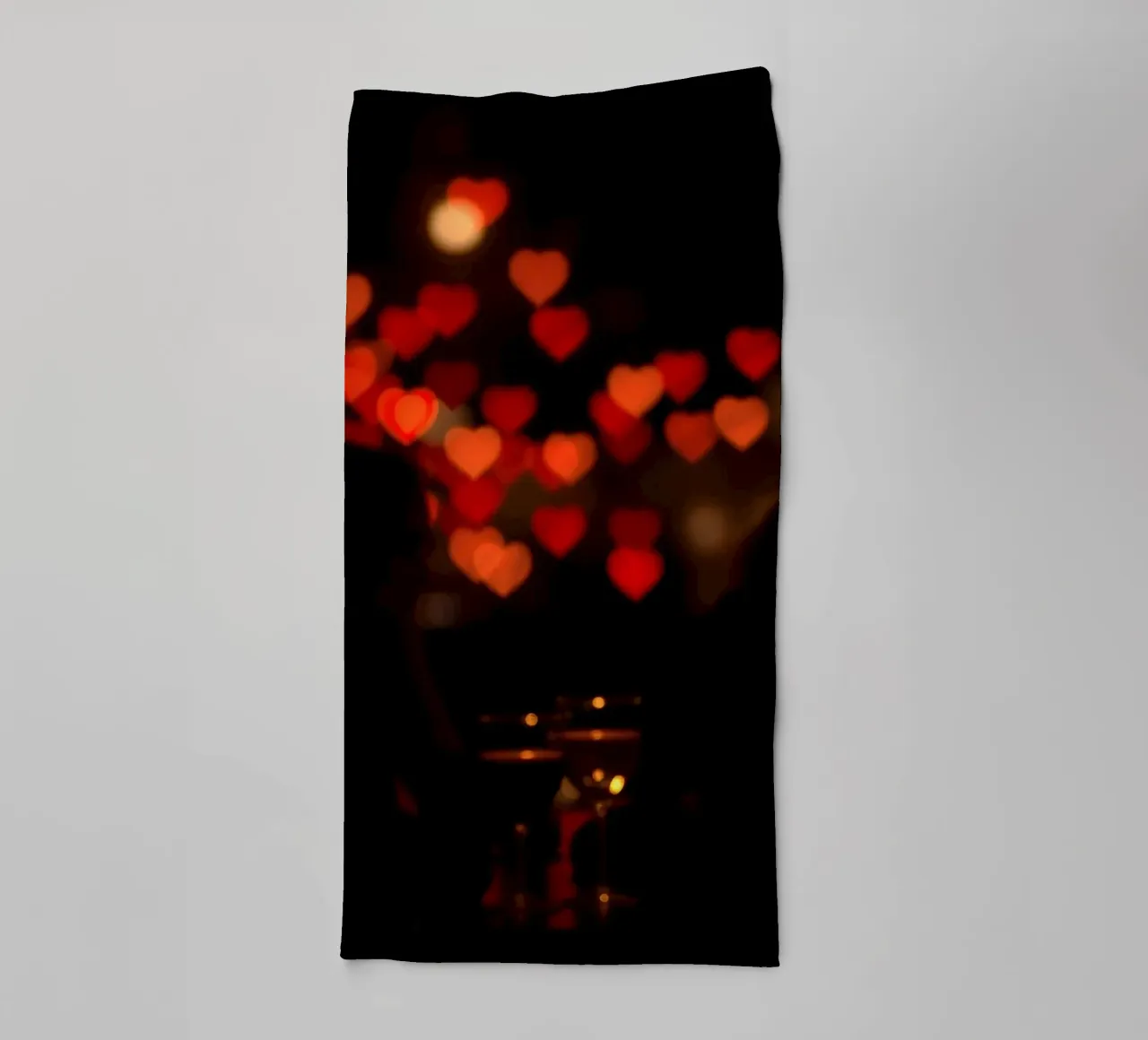 Romantic evening with heart-shaped lights in the background towel by DesignDoodle