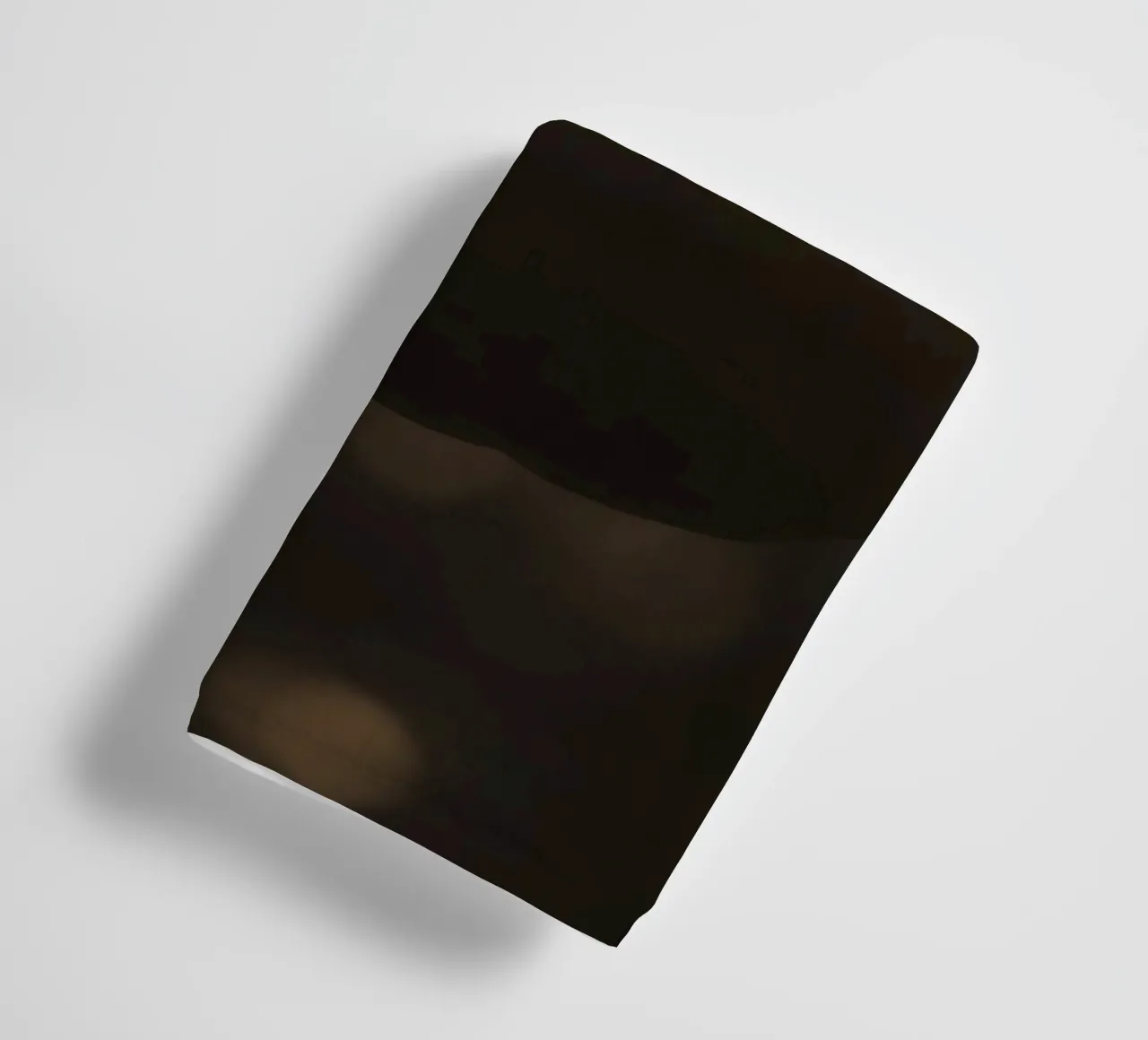 Sunlight filters through leaves highlighting a single orange towel by DesignDoodle