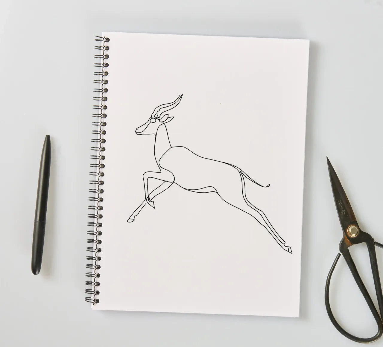 Antelope Jumping Minimalist Line Art spiral notebook by Viv Line Art