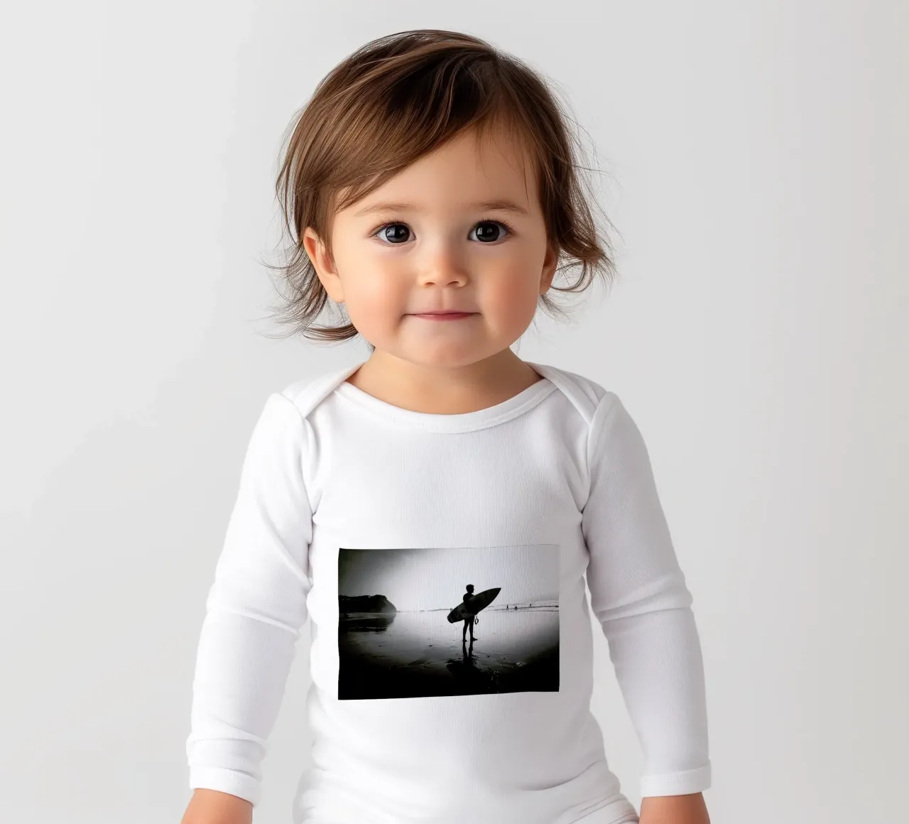 Off for a Surf I long-sleeve baby romper by Philipp Reinhard