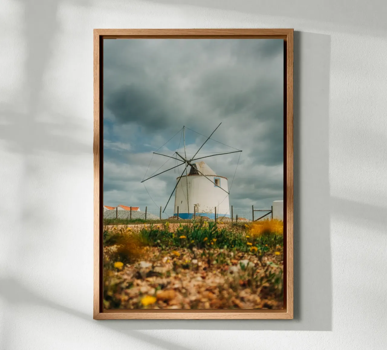Old windmill in Portugal - Landscape photo in the Algarve canvas with Floater frame by Bold and Retro