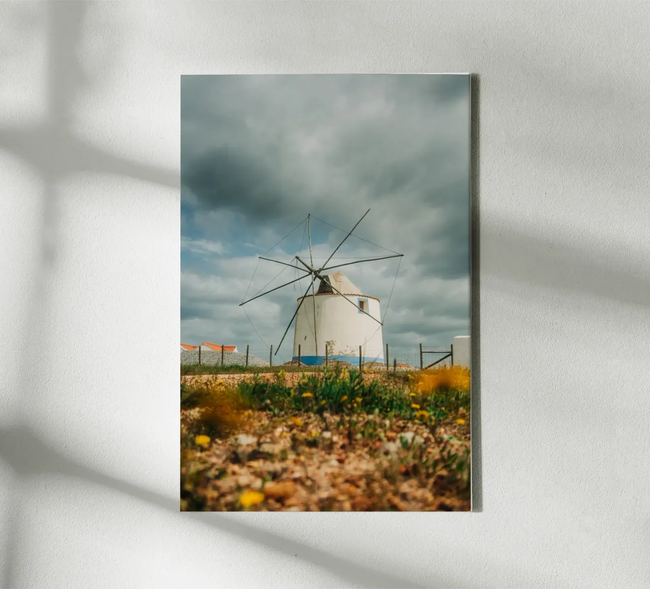 Old windmill in Portugal - Landscape photo in the Algarve canvas with Floater frame by Bold and Retro