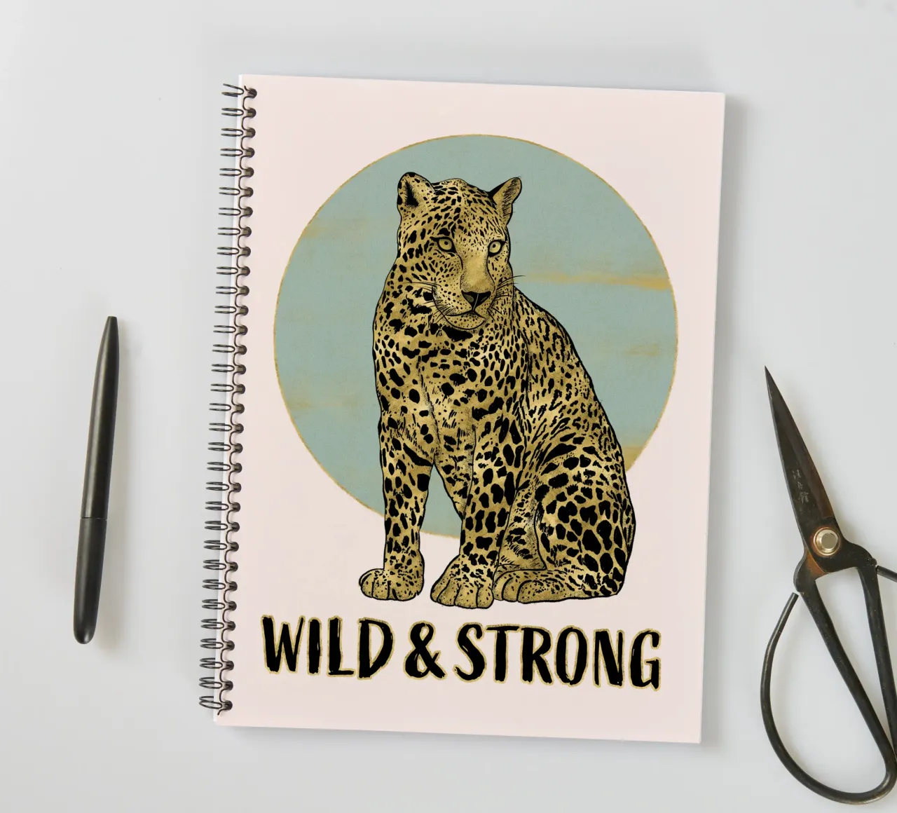 Wild and strong. Majestic sitting leopard with typo. spiral notebook by CalliLetters