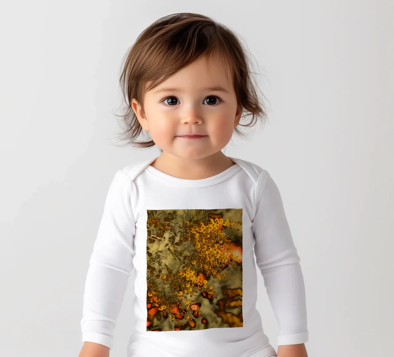 Stylized mimosa long-sleeve baby romper by Teresa André
