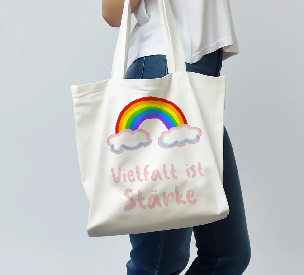 Rainbow and clouds tote bag by Face & Content
