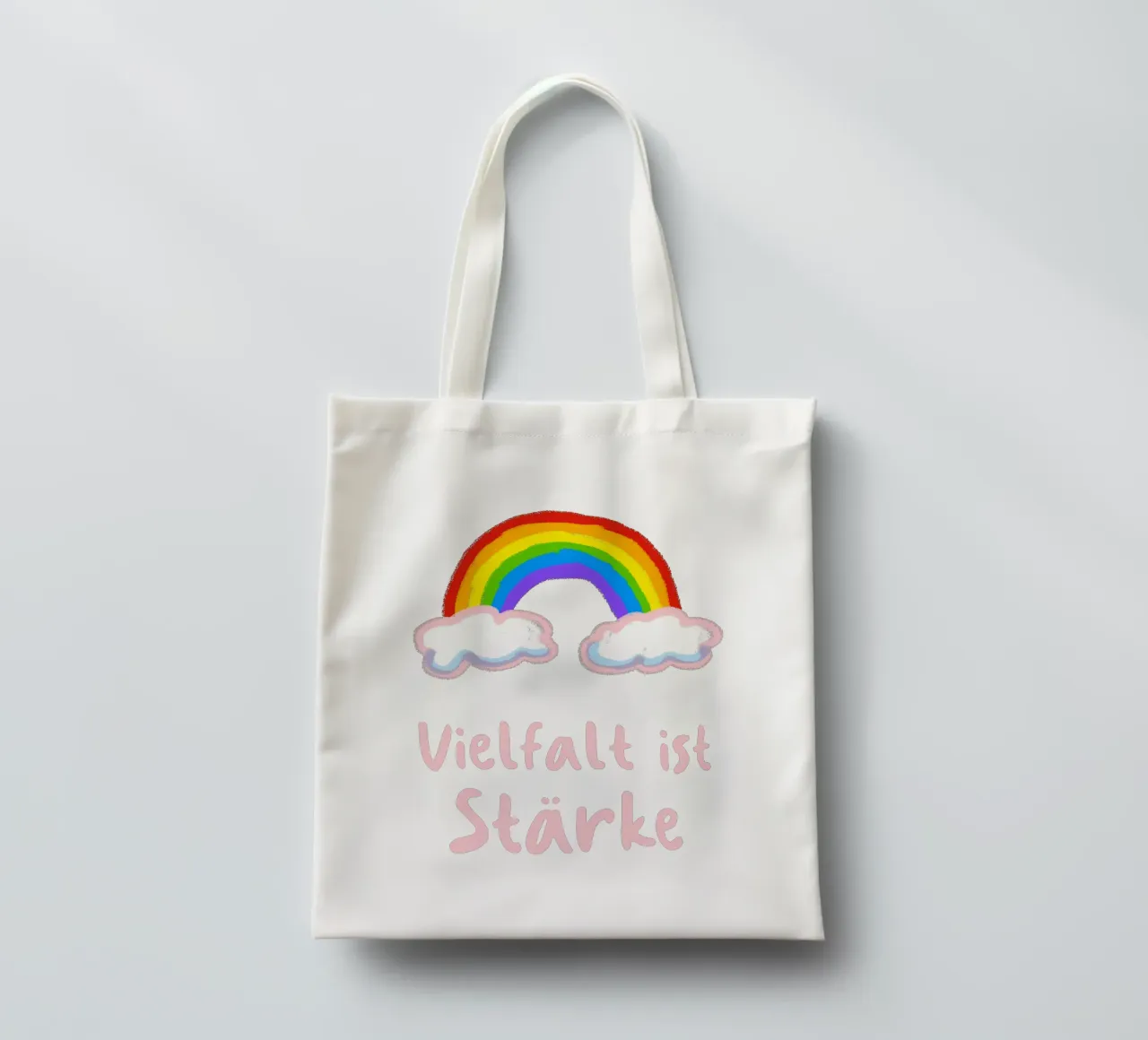 Rainbow and clouds tote bag by Face & Content