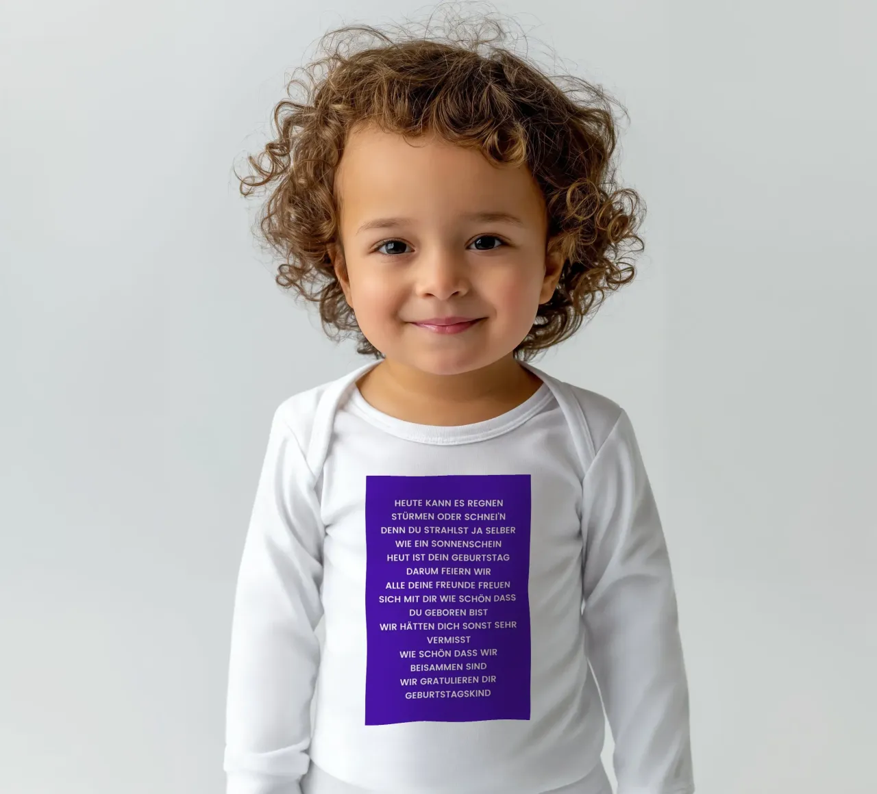 Geburtstagskind long-sleeve baby romper by Studio One