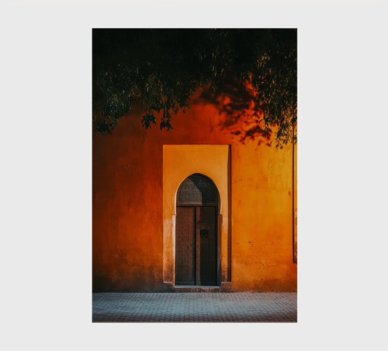 Mystical gateway to Marrakech at sunset notebook by By Night