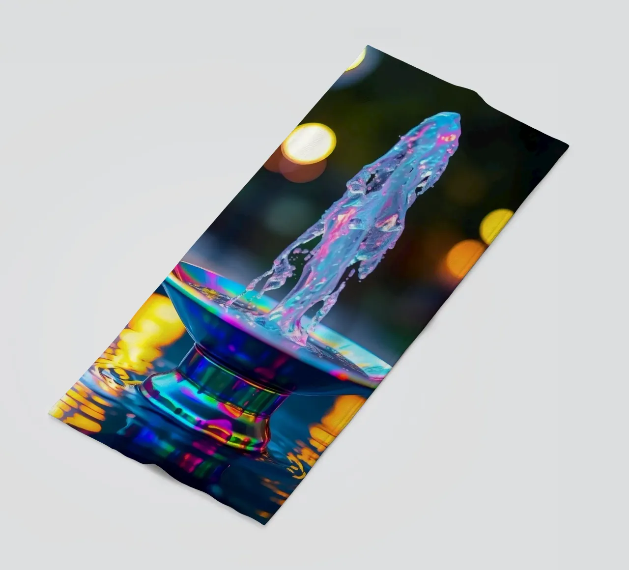 Une fontaine colorée crée un spectacle lumineux fascinant serviette de plage de DesignDoodle
