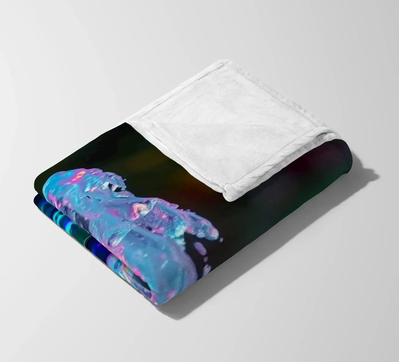 Colorful fountain creates a mesmerizing display of light fleece blanket by DesignDoodle
