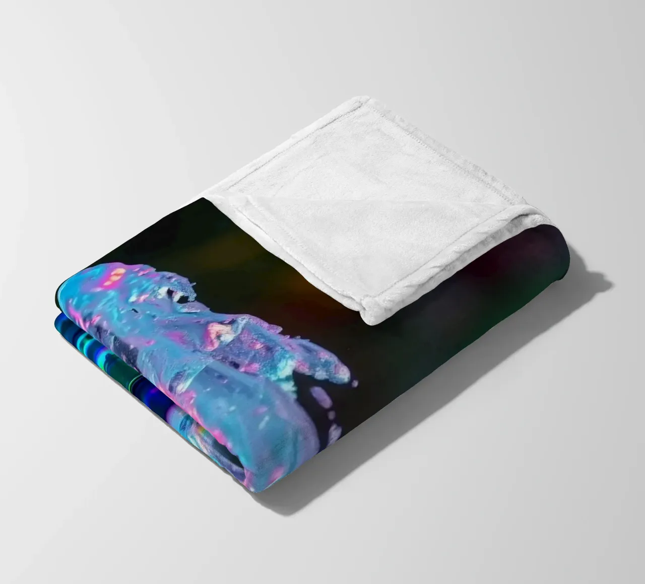 Colorful fountain creates a mesmerizing display of light fleece blanket by DesignDoodle