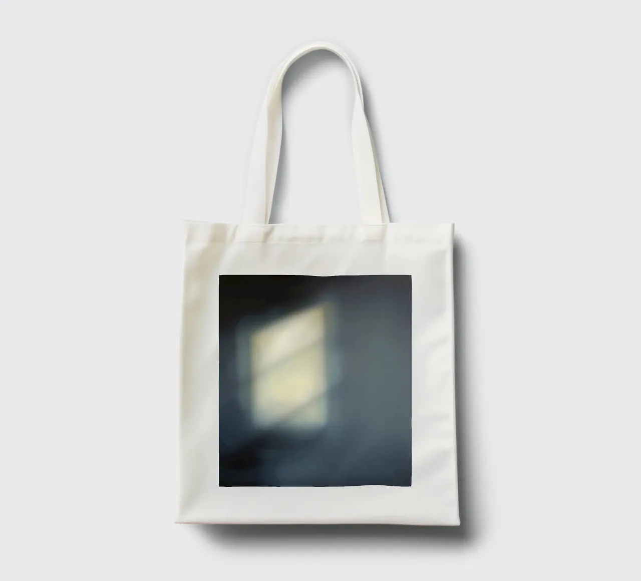 Soft light filters through a window, creating a hazy ambianc tote bag by DesignDoodle