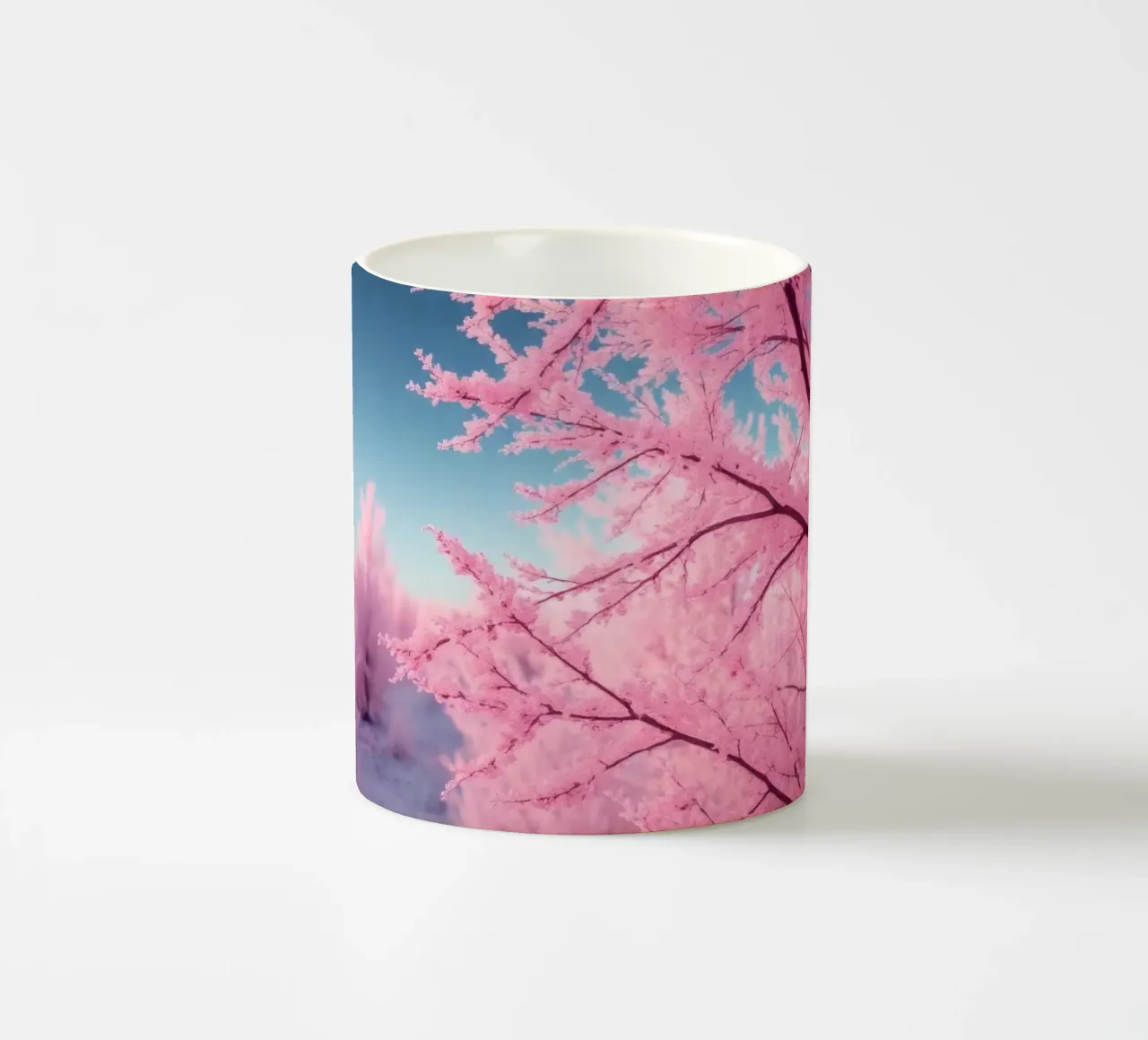 Bellissimi alberi rosa in un paesaggio etereo al tramonto con tazza in ceramica da DesignDoodle