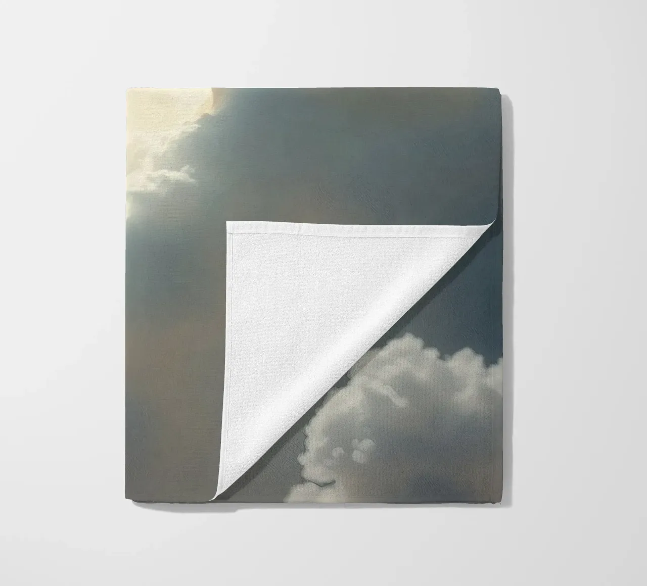 Majestic clouds illuminated by sunlight reveal ethereal shap beach towel by DesignDoodle