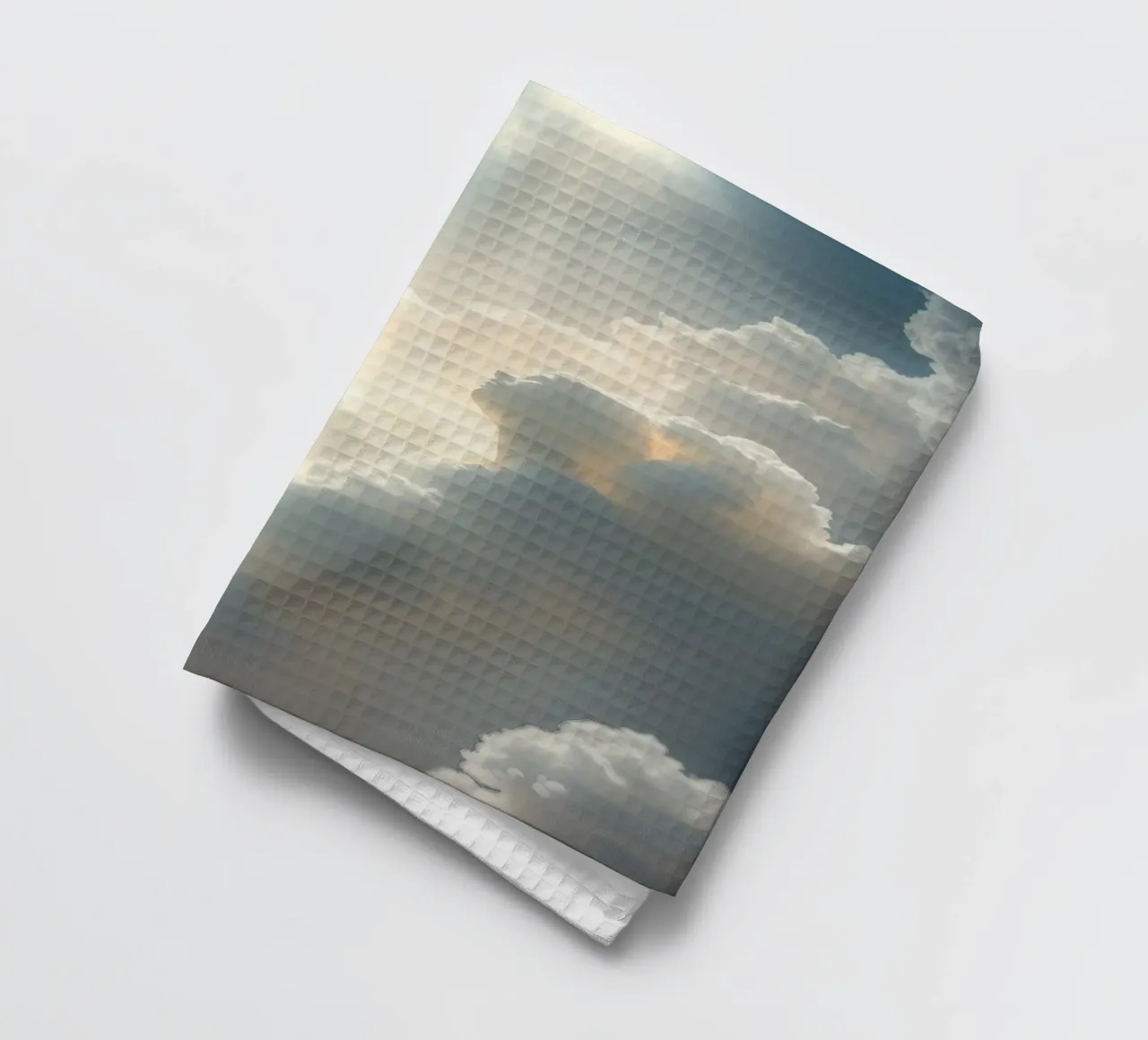 Les nuages majestueux illuminés par la lumière du soleil révèlent des formes éthérées. torchon de DesignDoodle