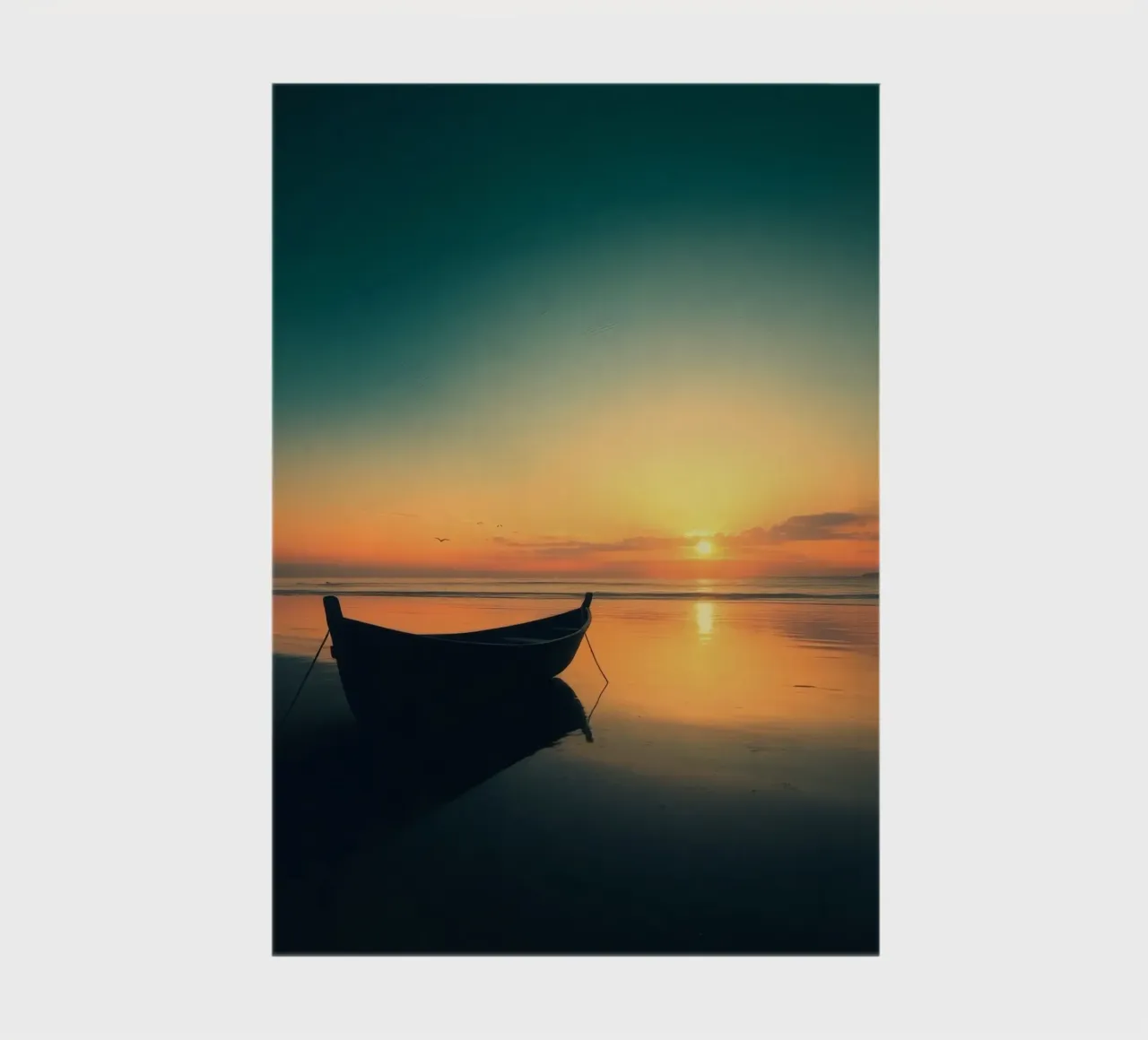 Silhouetted boat resting on calm water at sunset with vibran notebook by DesignDoodle