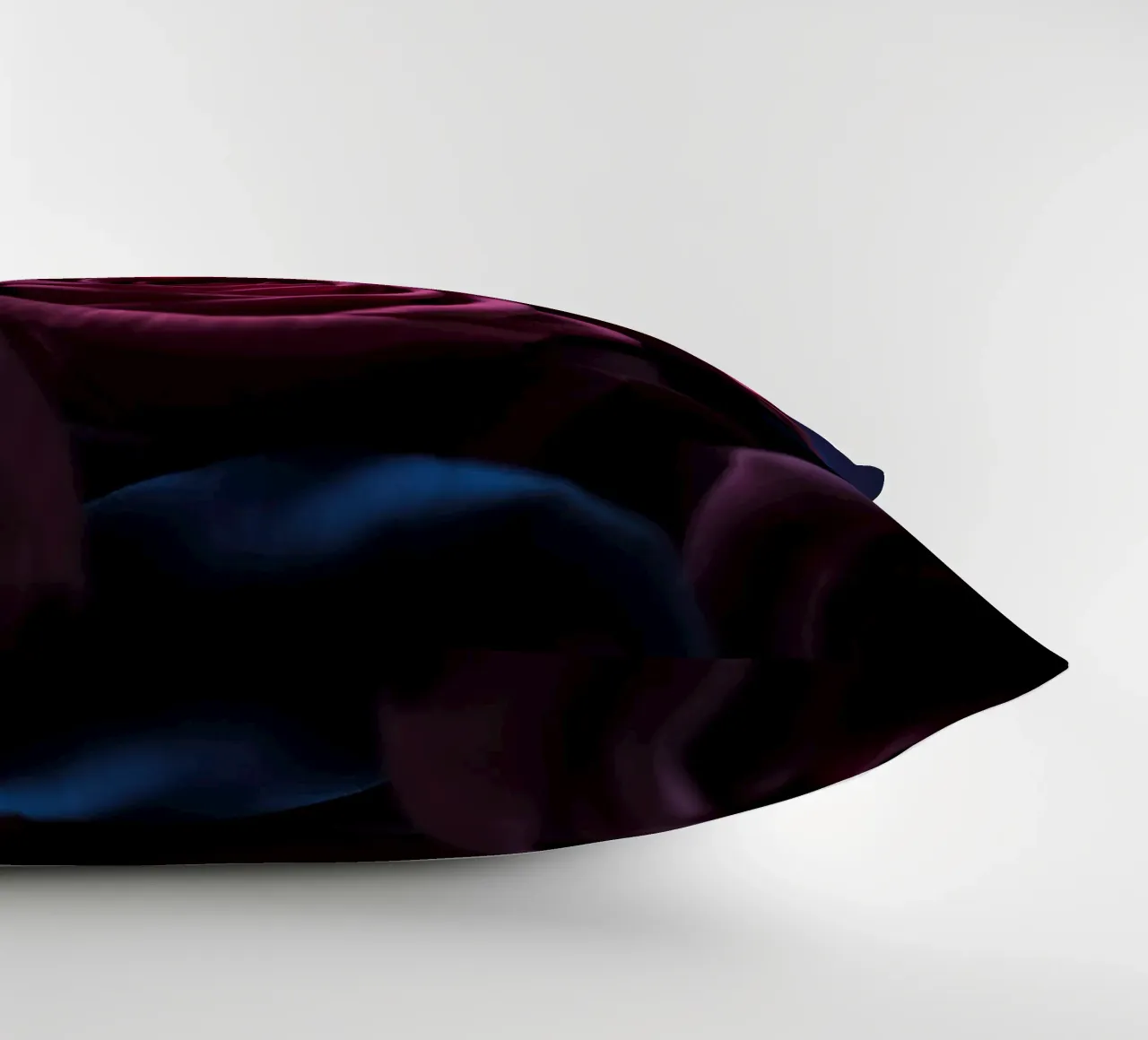 Bouquets of deep red roses arranged artfully in low light decorative cushion by DesignDoodle