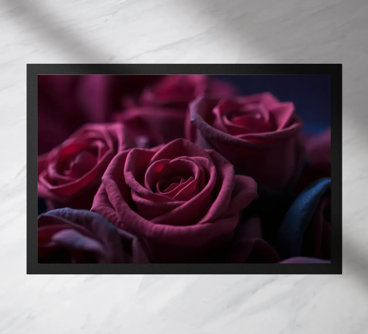Bouquets of deep red roses arranged artfully in low light doormat by DesignDoodle