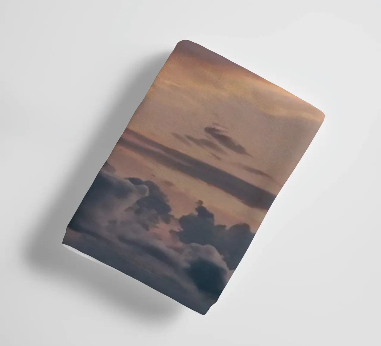 Vibrant sunset over layered clouds in a peaceful sky at dusk towel by DesignDoodle