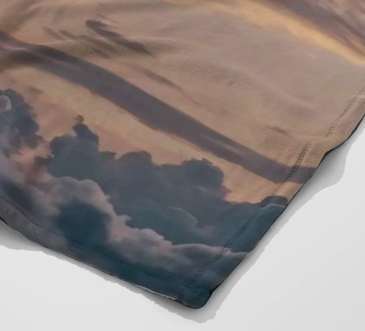 Vibrant sunset over layered clouds in a peaceful sky at dusk fleece blanket by DesignDoodle
