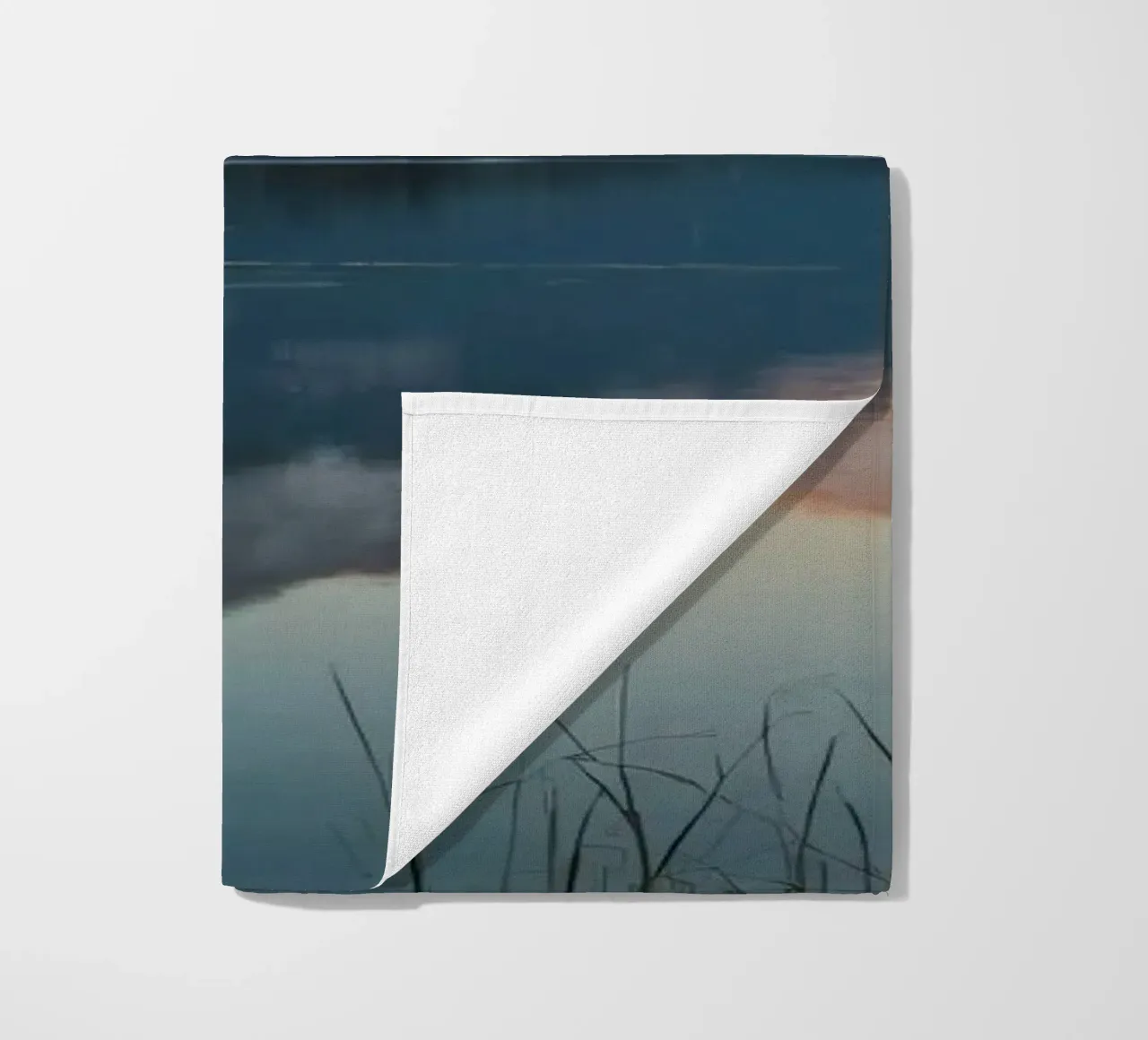 Reflections of majestic mountains at twilight over a lake beach towel by DesignDoodle