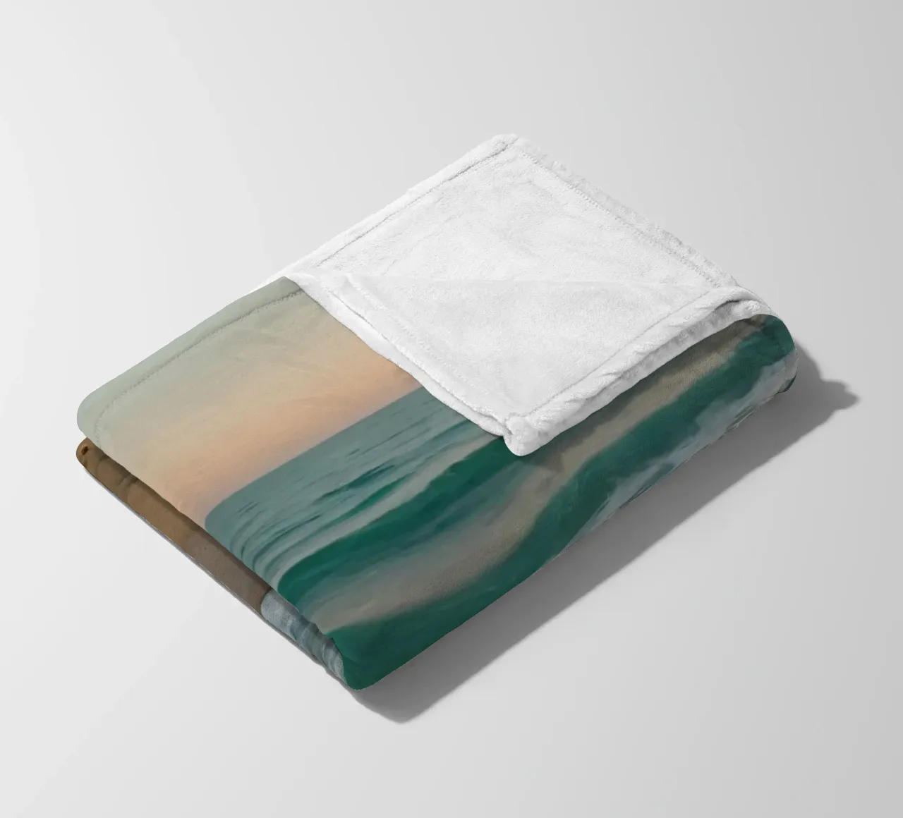 Soft waves lap against golden sand under a colorful sky fleece blanket by DesignDoodle