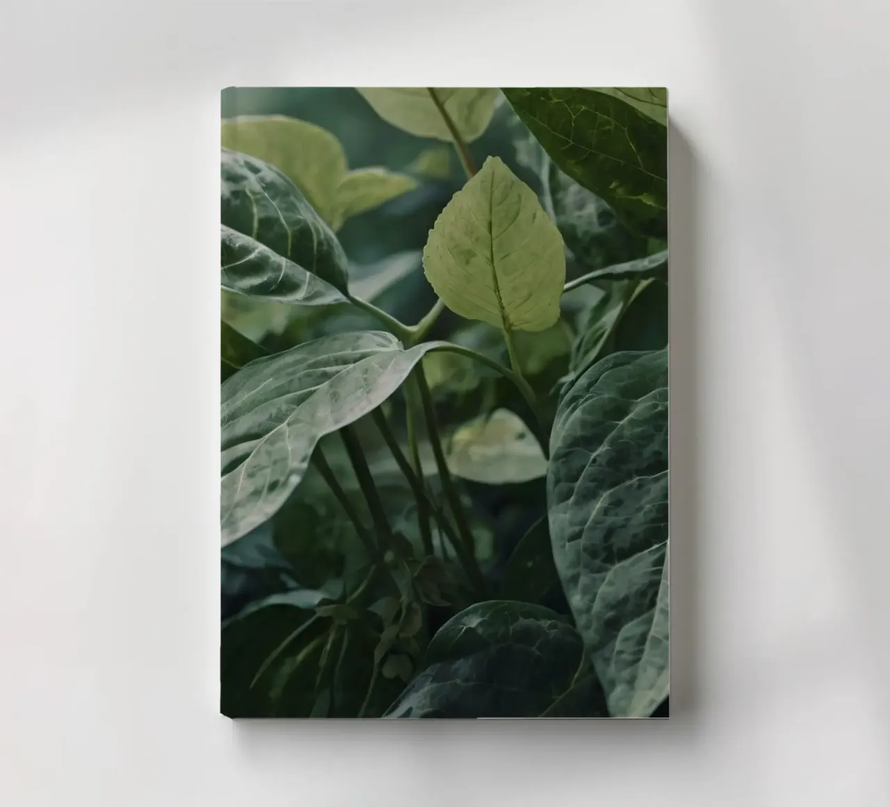 Lush green leaves with varying textures in tranquil natural notebook by DesignDoodle