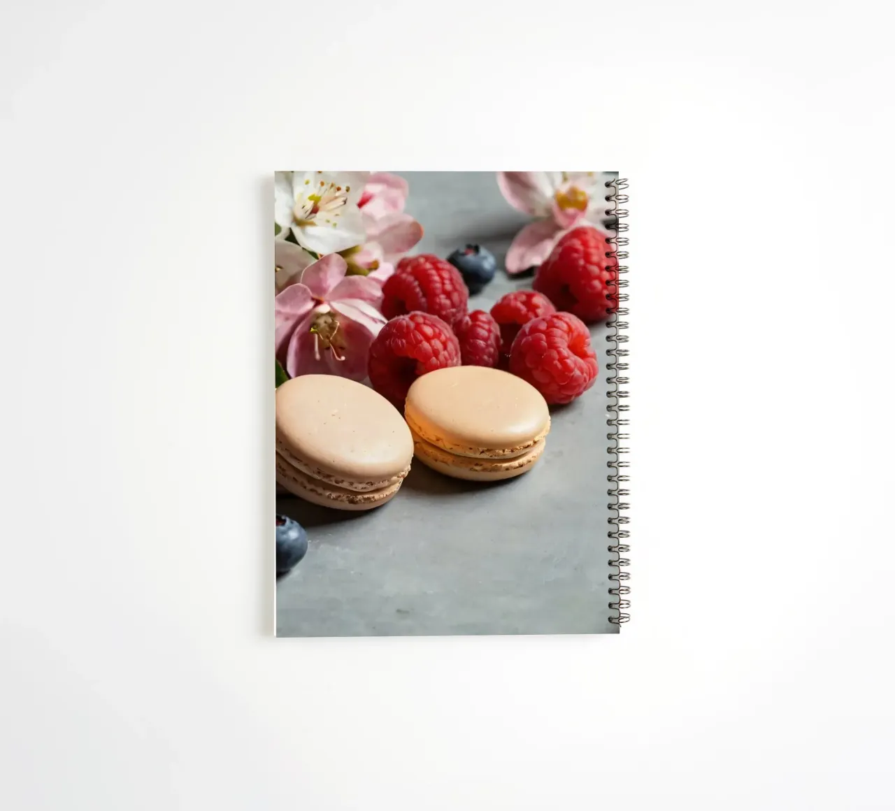 Freshly made macarons surrounded by vibrant berries spiral notebook by DesignDoodle