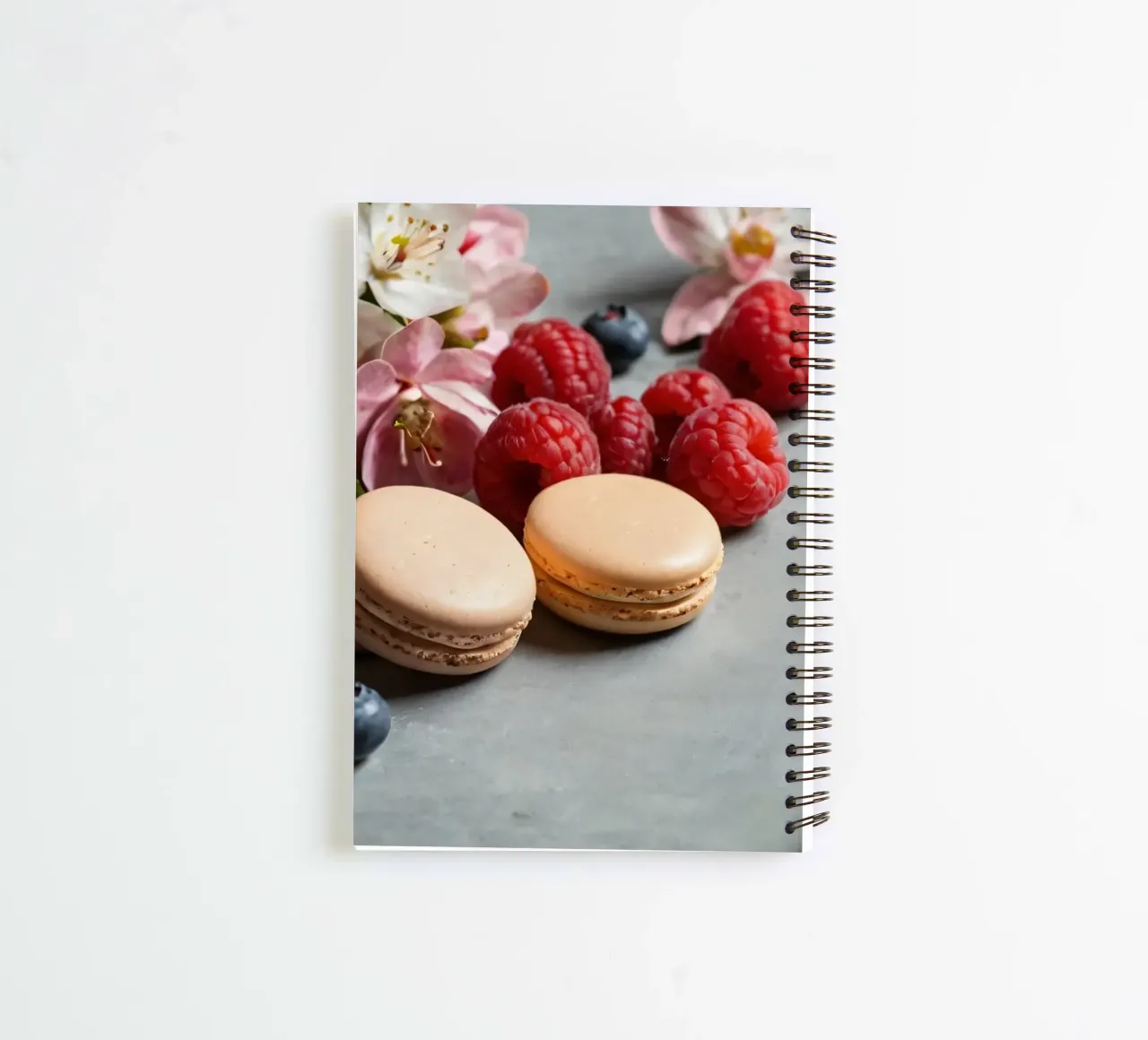 Freshly made macarons surrounded by vibrant berries spiral notebook by DesignDoodle
