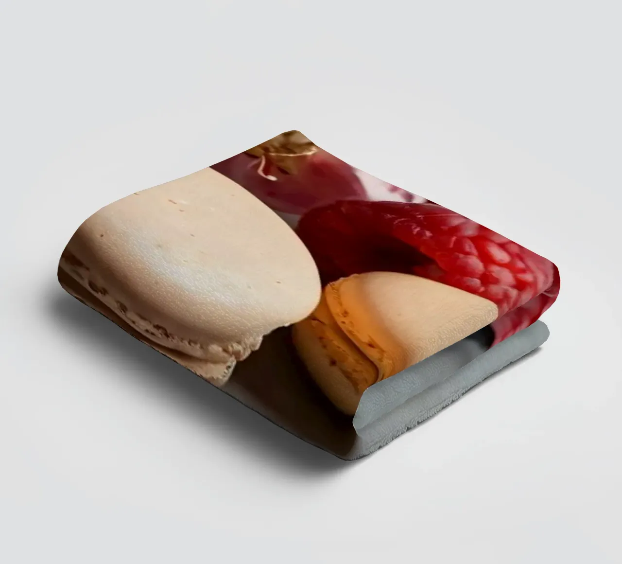 Freshly made macarons surrounded by vibrant berries towel by DesignDoodle