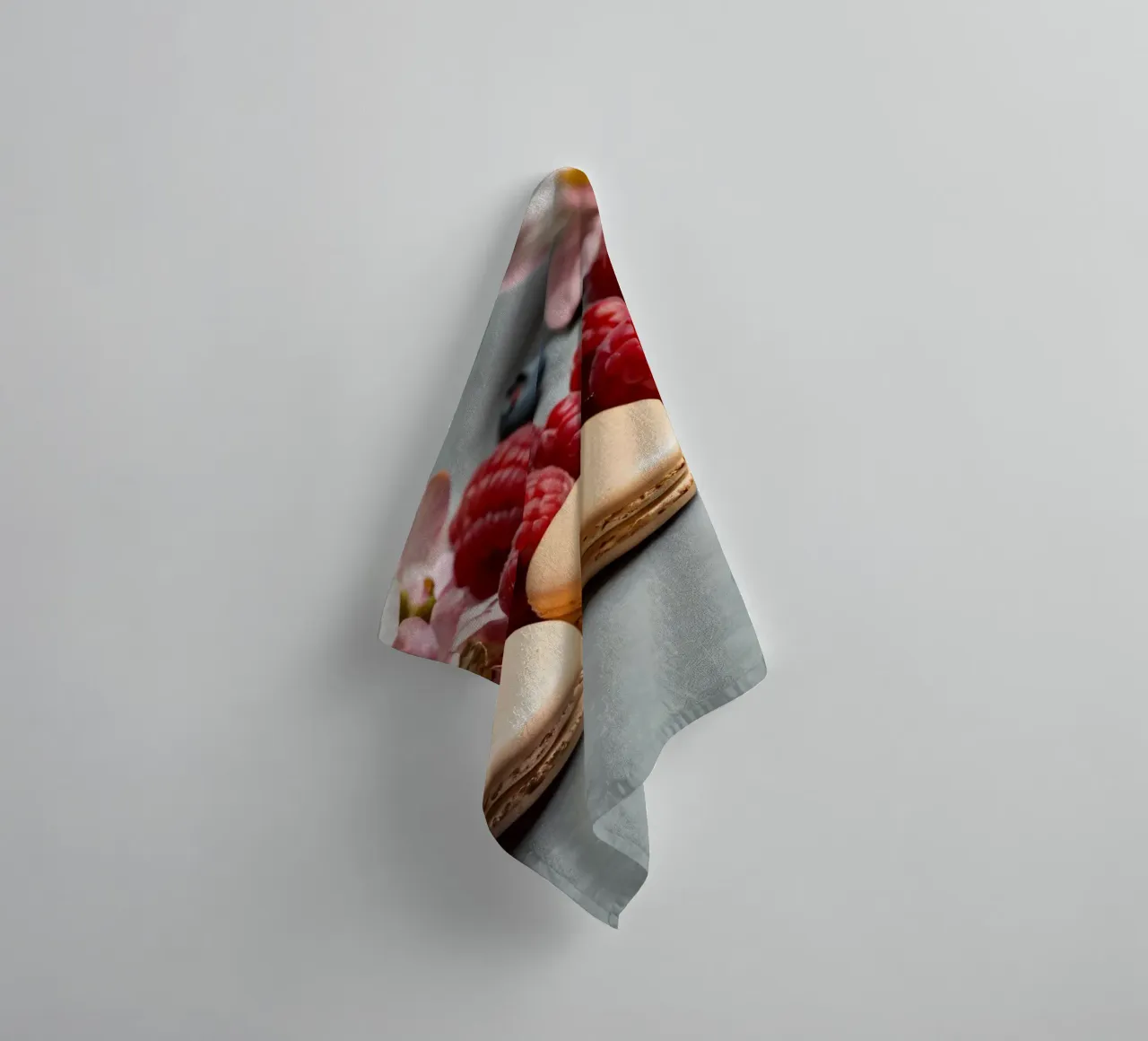 Freshly made macarons surrounded by vibrant berries towel by DesignDoodle