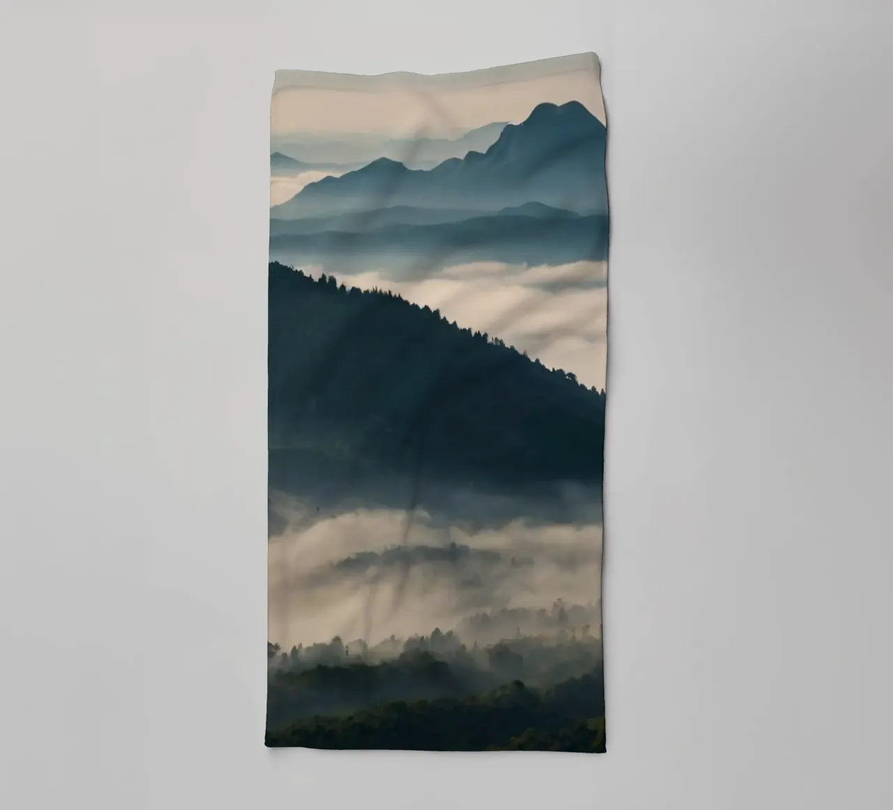 Majestic mountain range shrouded in mist towel by DesignDoodle