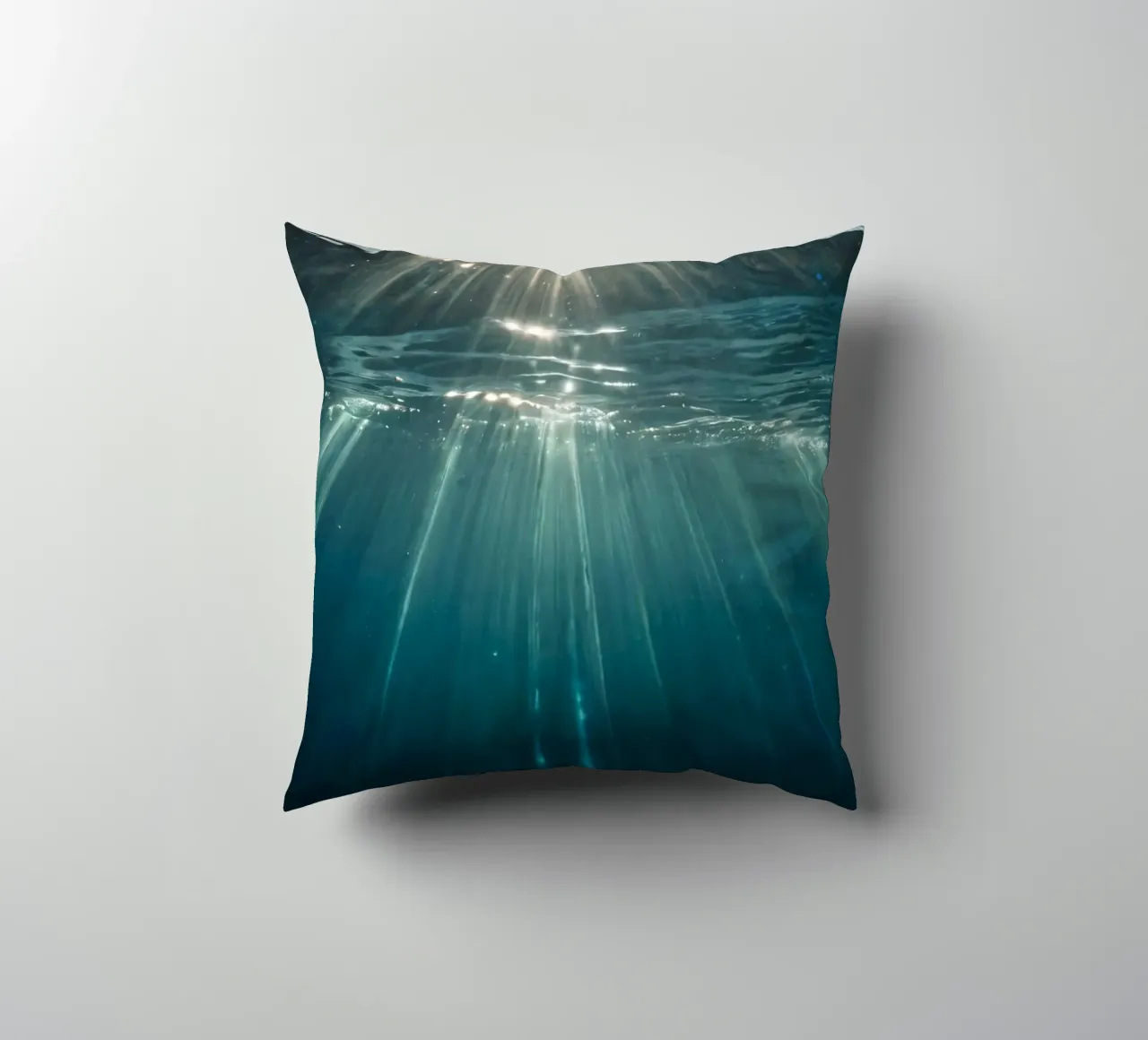 Sunlight streams through clear water mesmerizing pattern decorative cushion by DesignDoodle