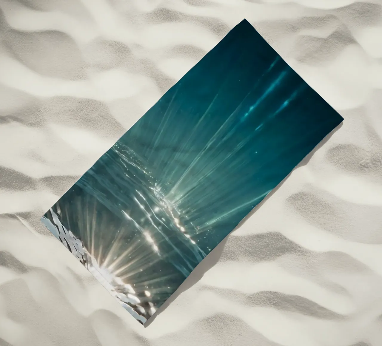 Sunlight streams through clear water mesmerizing pattern beach towel by DesignDoodle