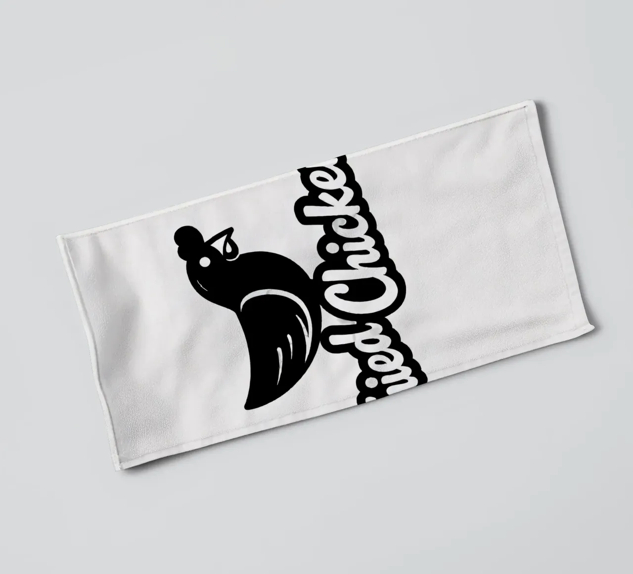 Een speels ontwerp met een cartoonfiguurtje in de vorm van een kip badhanddoek van DesignDoodle