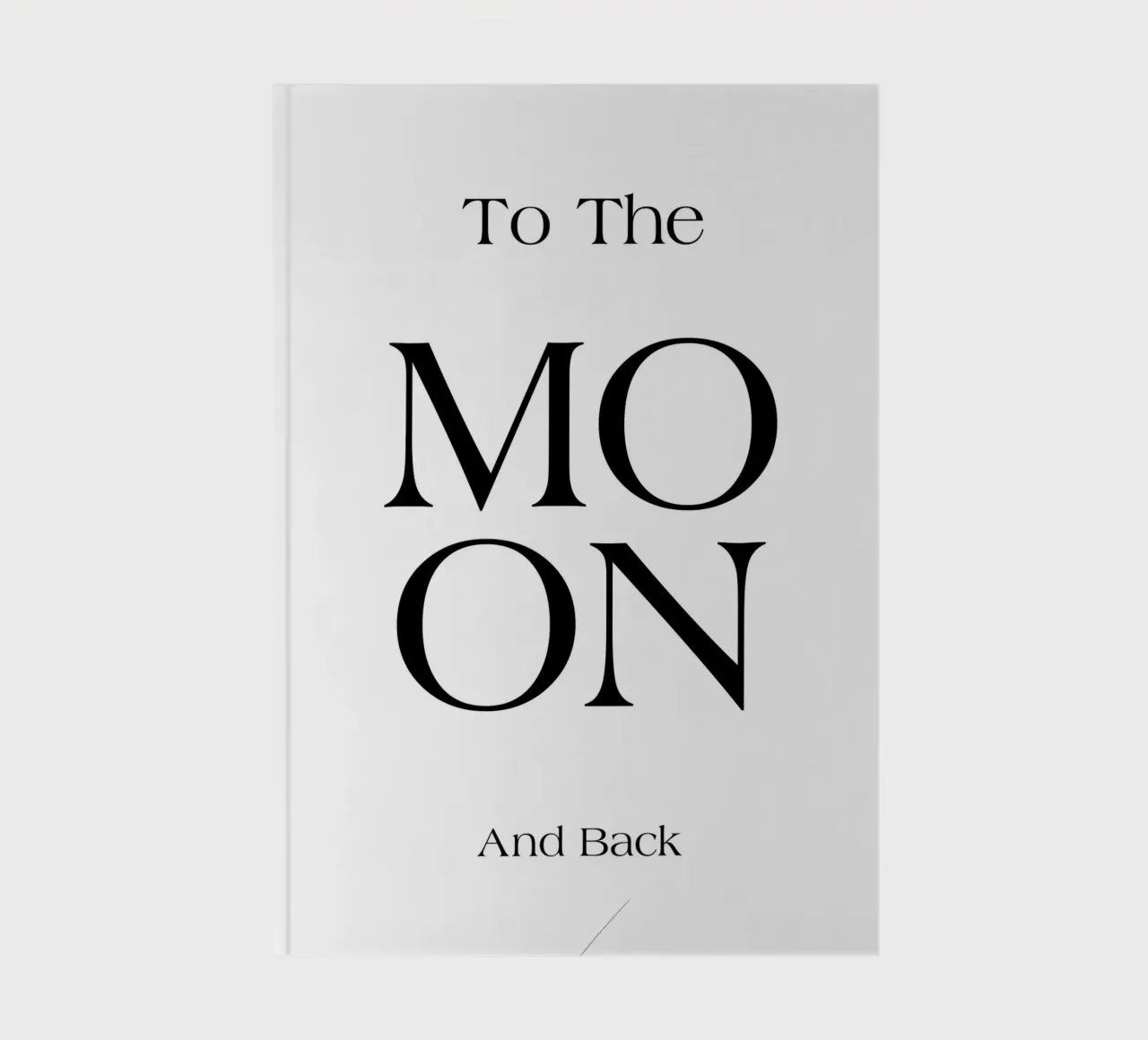 Naar de maan en zwart notitieboek van YV TYPOGRAPHY