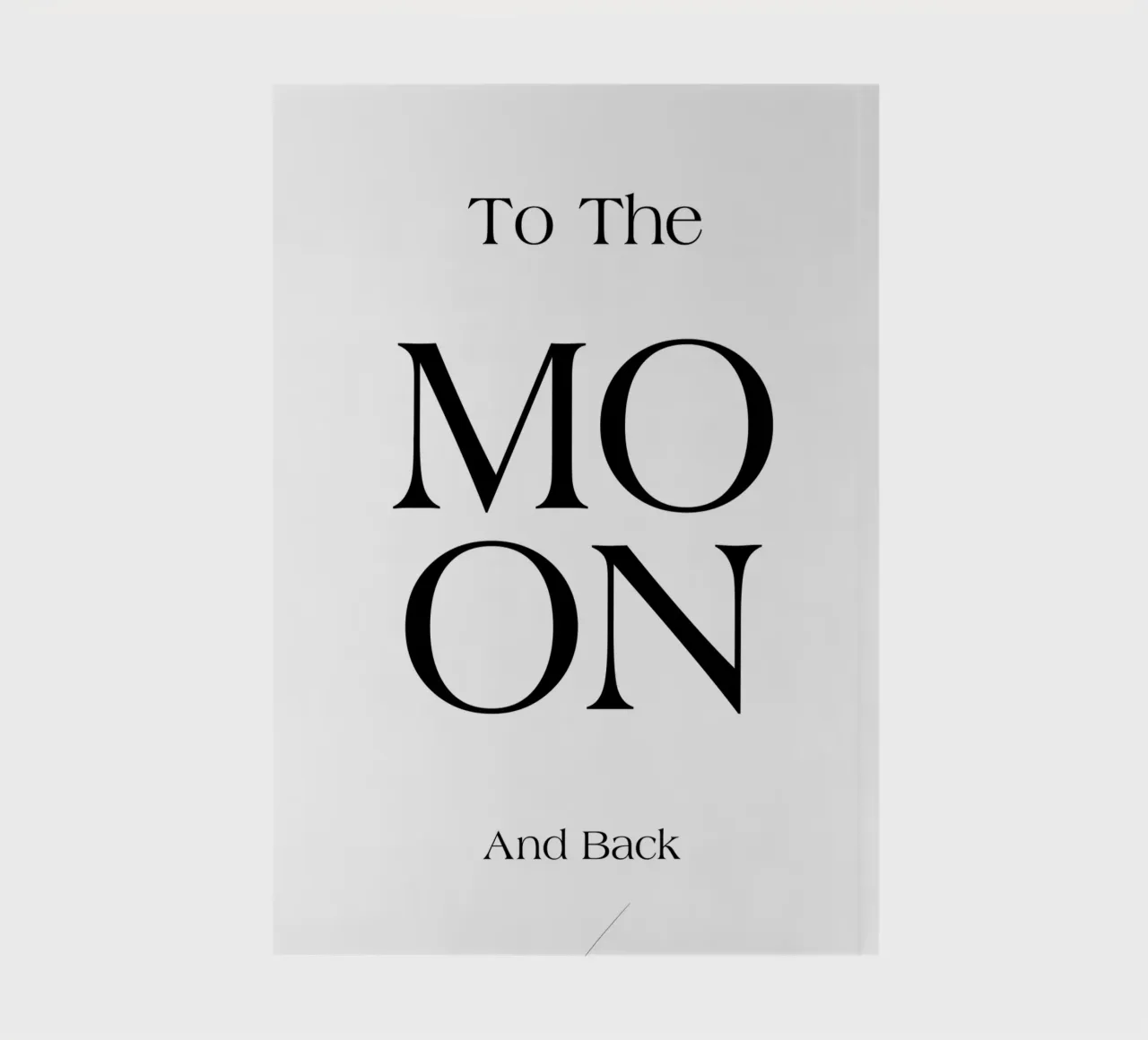 Naar de maan en zwart notitieboek van YV TYPOGRAPHY