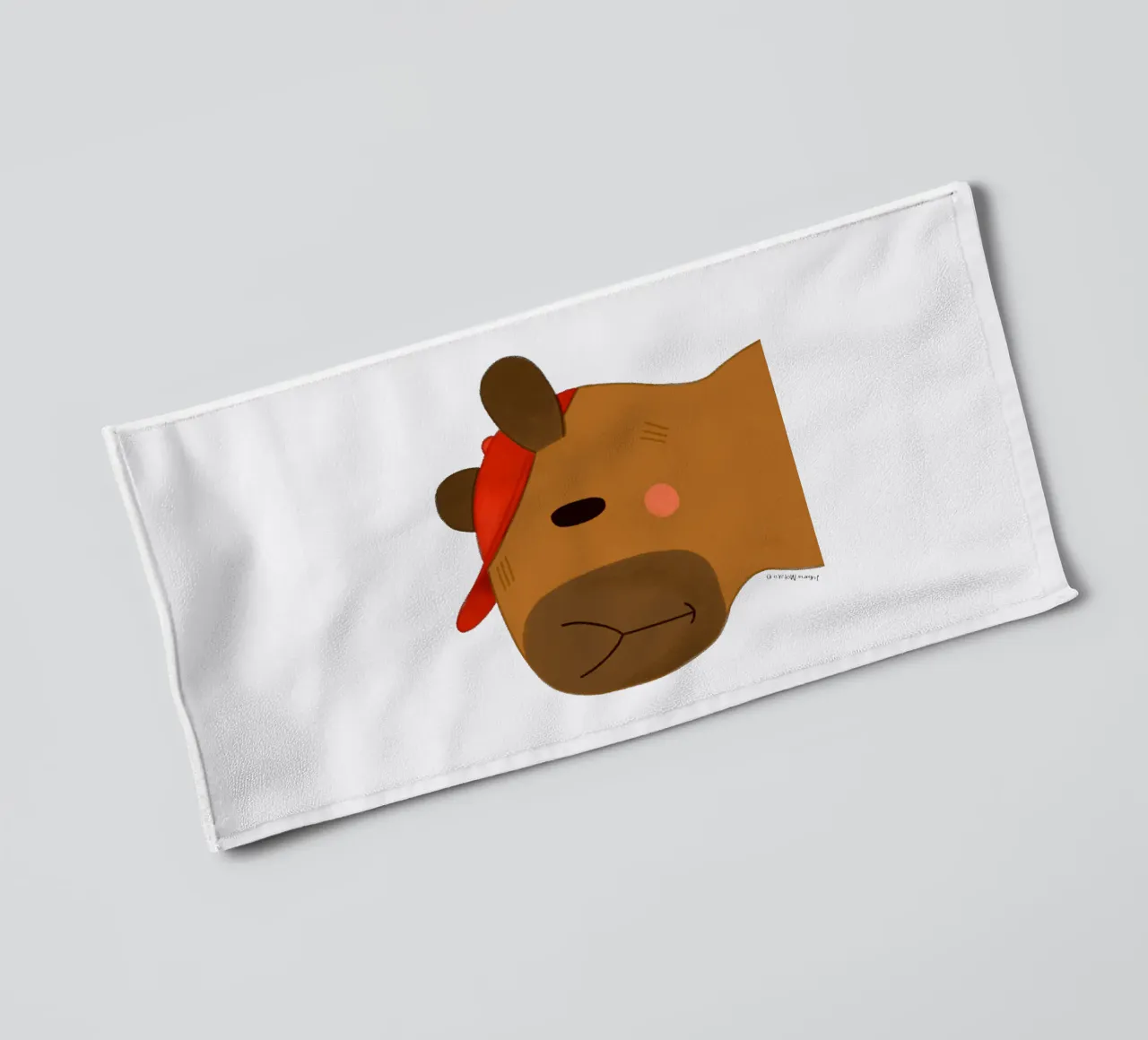 Capybara with red cap towel by julianamotzko