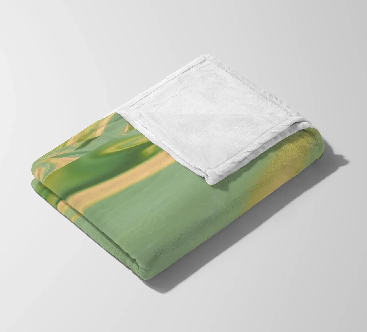 Abstract round patterns in green and yellow fleece blanket by Something for you