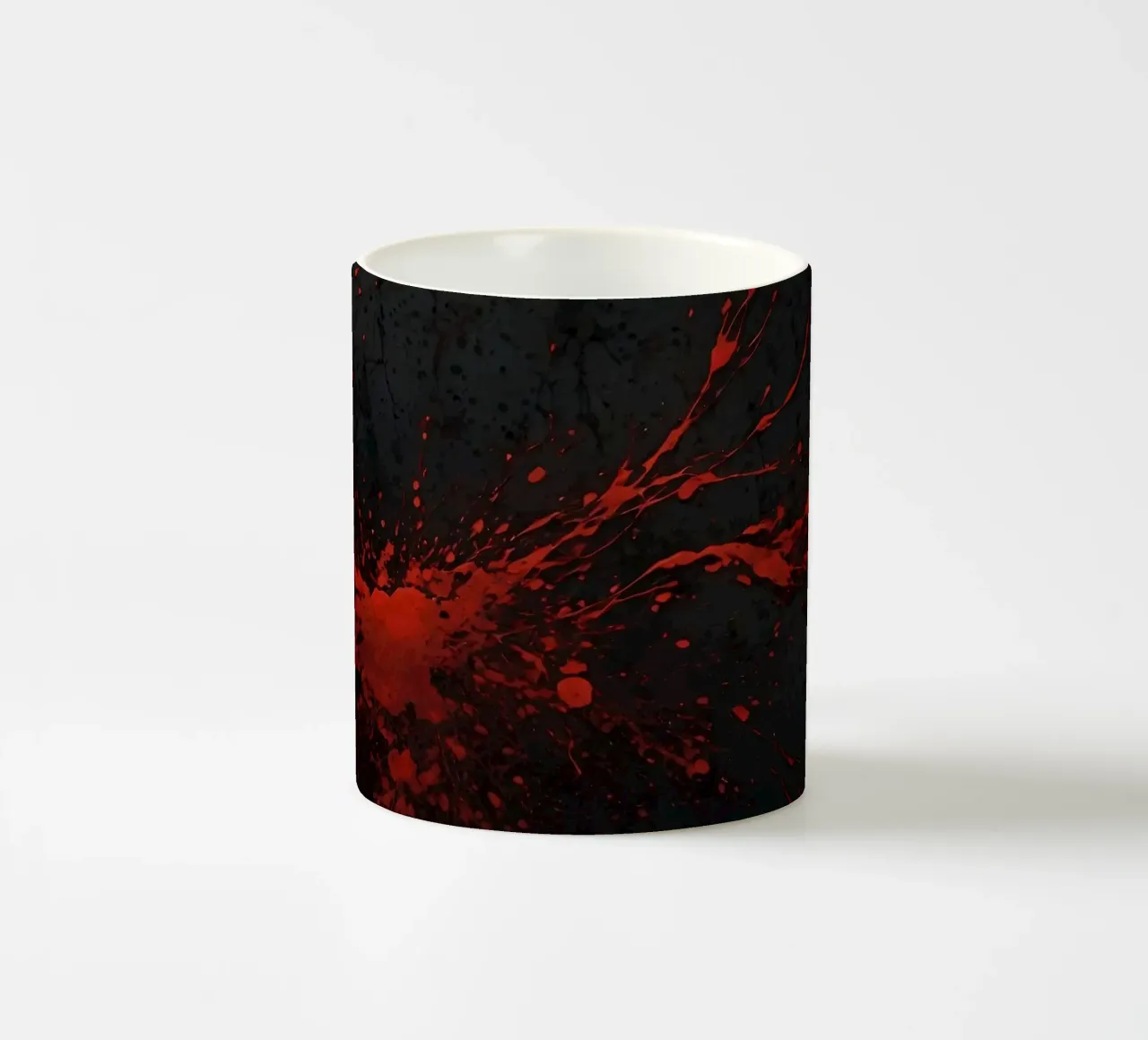 Bold red paint splatters on a dark textured background ceramic mug by DesignDoodle