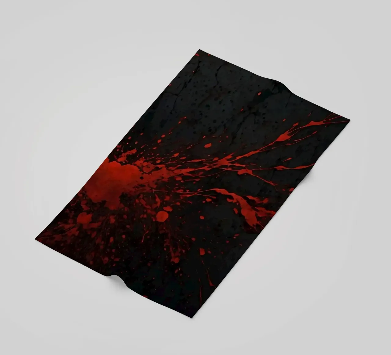 Bold red paint splatters on a dark textured background beach towel by DesignDoodle