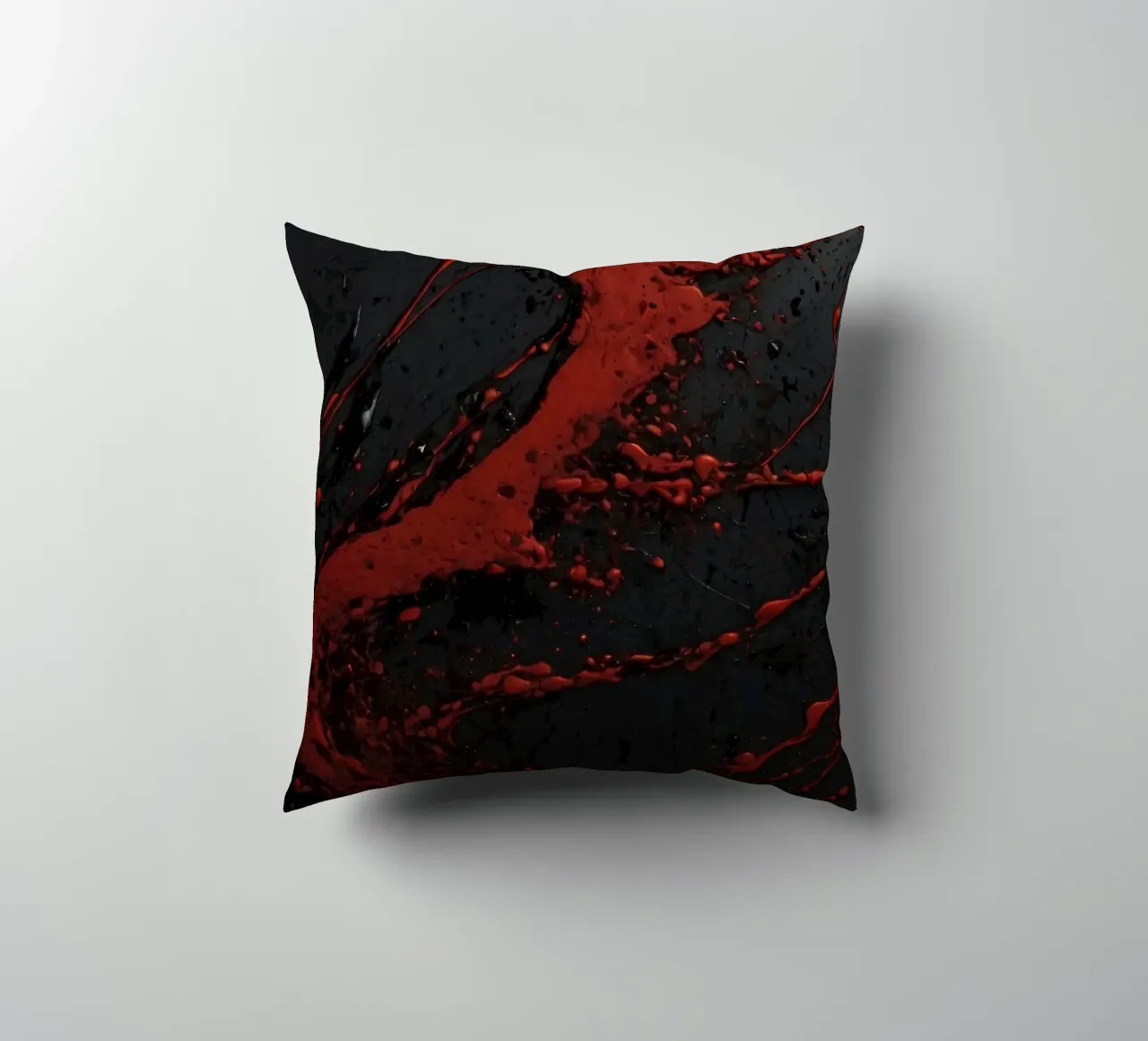Schizzi astratti di vernice rossa su una superficie nera cuscino da DesignDoodle